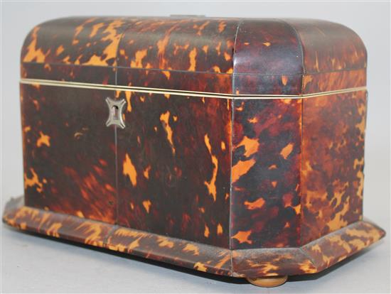 A Victorian tortoiseshell two division tea caddy, 9in.